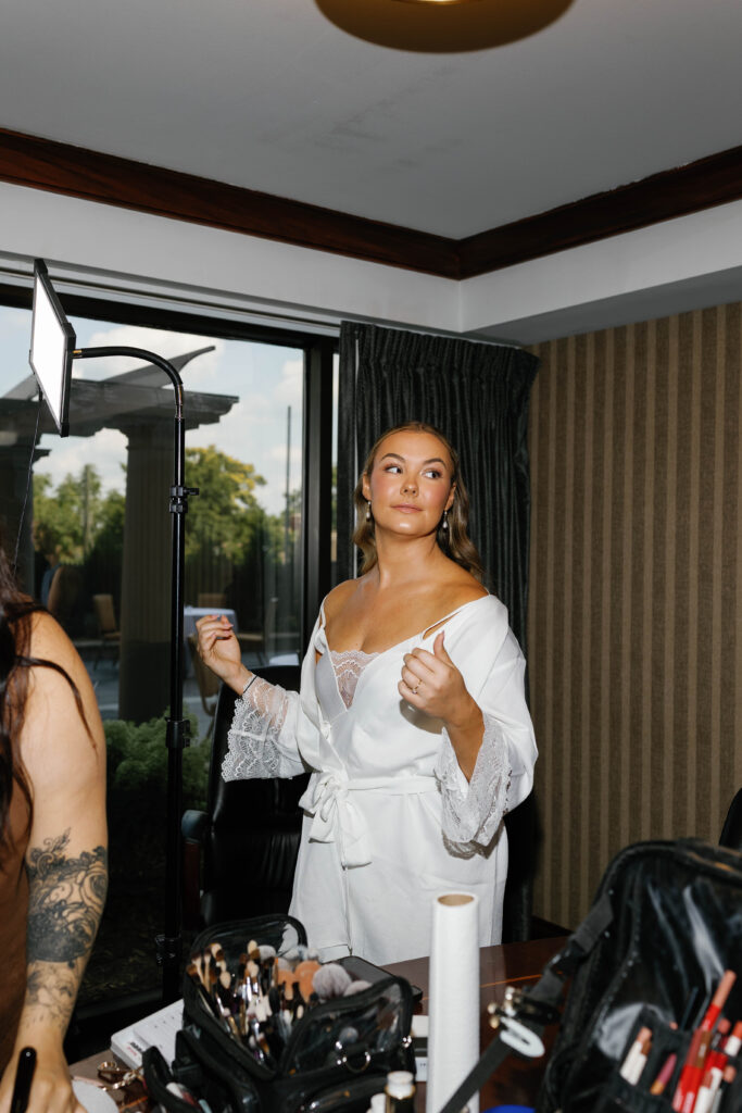 Bride getting ready at graduate hotel in ann arbor michigan