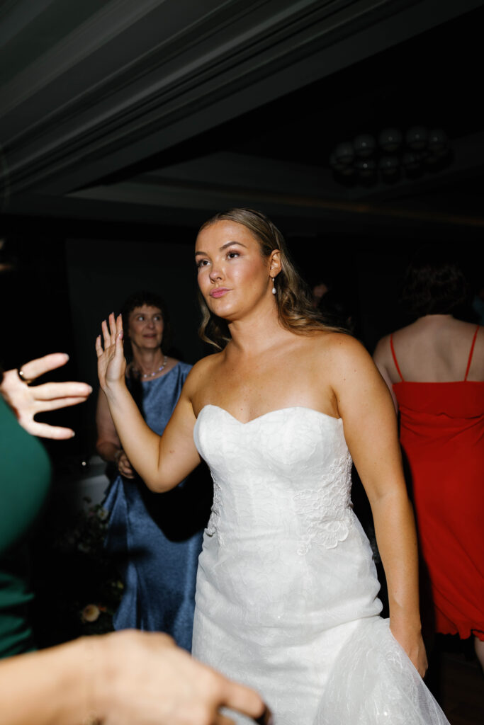 Bride dancing during wedding reception