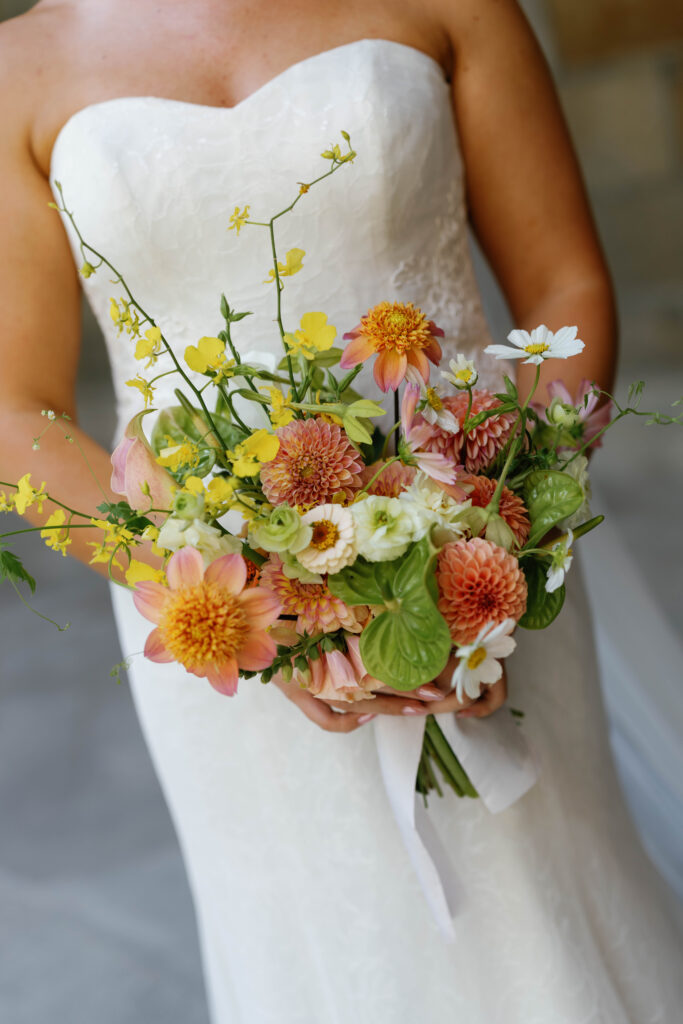 Up close image of bride holding her bouquet