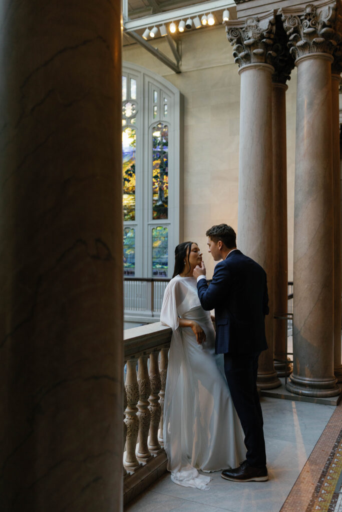 Art Institute of Chicago engagement photos romantic couple portrait between grand columns