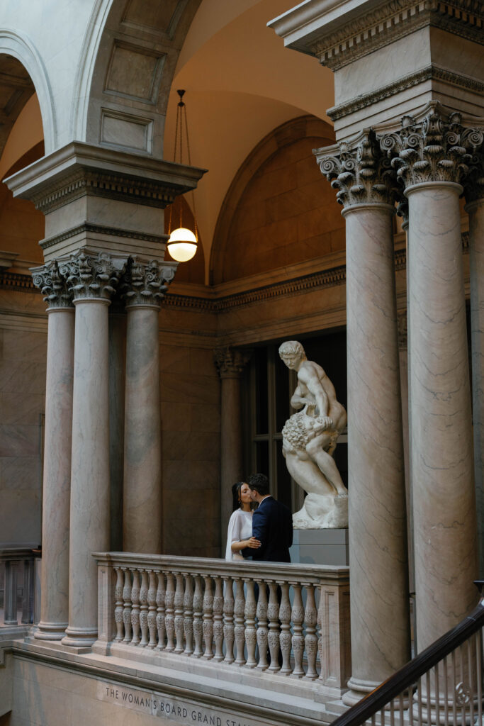 Art Institute of Chicago engagement photos romantic couple portrait between grand columns